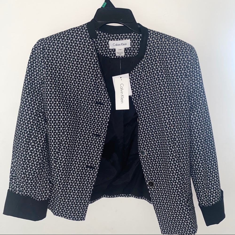 Calvin Klein Black and white button up size : 14